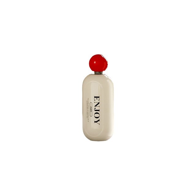 Cream washable pet hair roller with red spherical handle, upright on white background.